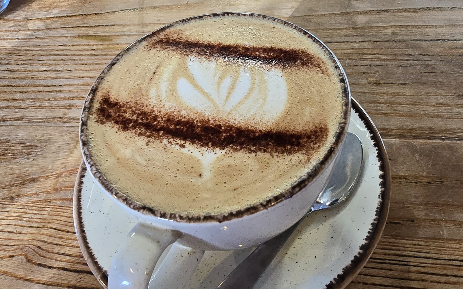 Cappuccino on a wooden table
